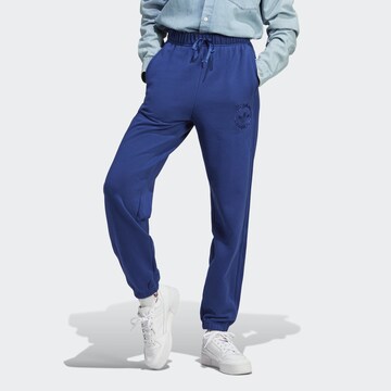 ADIDAS ORIGINALS Tapered Pants in Blue: front