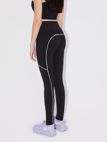 Skinny Pantalon de sport 'Jannia' LeGer by Lena Gercke en noir