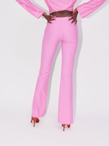 ABOUT YOU REBIRTH STUDIOS Flared Trousers 'LIVIA' in Pink