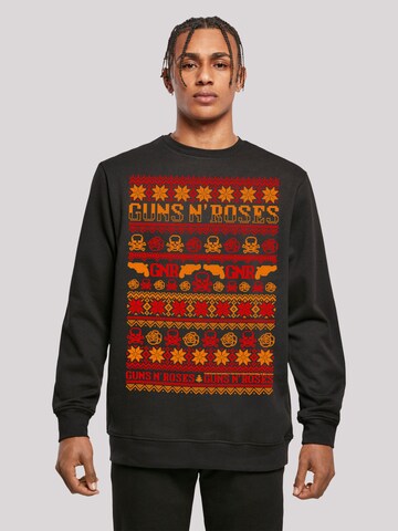 Sweat-shirt 'Guns And Roses Weihnachten Christmas' F4NT4STIC en noir : devant