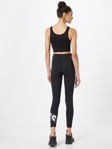 Skinny Pantaloni sport de la ASICS pe negru