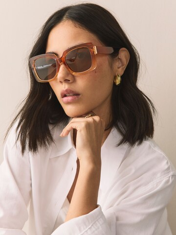 Next Sončna očala | oranžna barva