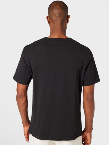 T-Shirt fonctionnel 'PUMAxABOUT YOU' PUMA en noir