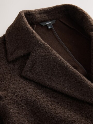 Next Mantel in Braun