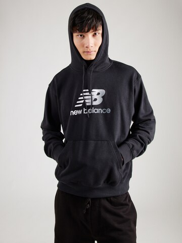 new balance Μπλούζα φούτερ σε μαύρο: μπροστά
