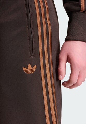 ADIDAS ORIGINALS - regular Pantalón 'Firebird' en marrón