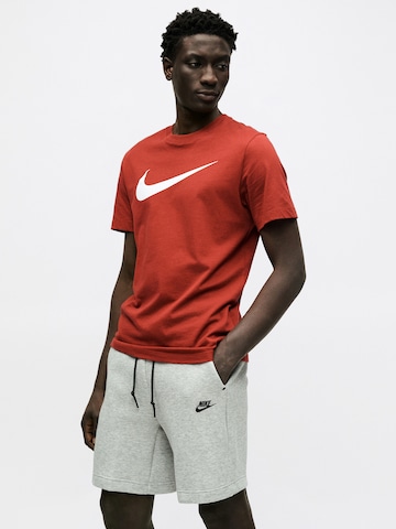 Loosefit Pantaloni 'TECH FLC' di Nike Sportswear in grigio