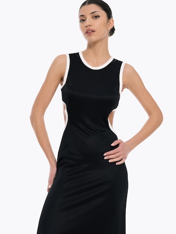 4TAILORS Mekko 'Echo' värissä musta