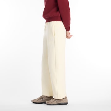 new balance - Regular Calças 'LNY Knit Pant' em bege