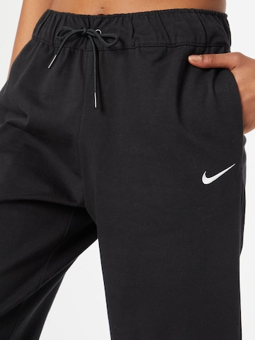 Nike Sportswear Tapered Pants in Black