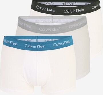 Boxeri de la Calvin Klein pe gri: față