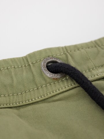 Tapered Pantaloni di ALPHA INDUSTRIES in verde