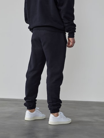 DAN FOX APPAREL Tapered Pants 'Danilo' in Black