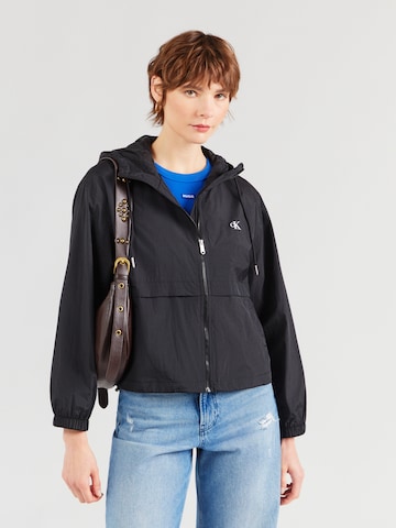 Calvin Klein Jeans Välikausitakki värissä musta: etupuoli