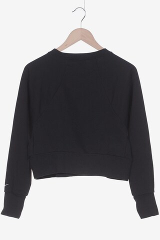 NIKE Sweater XS in Schwarz