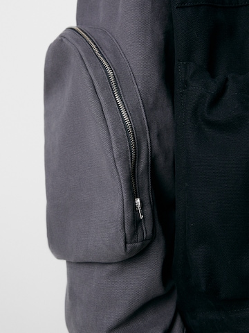 KARL LAGERFELD JEANS Prehodna jakna 'ATELIER' | črna barva