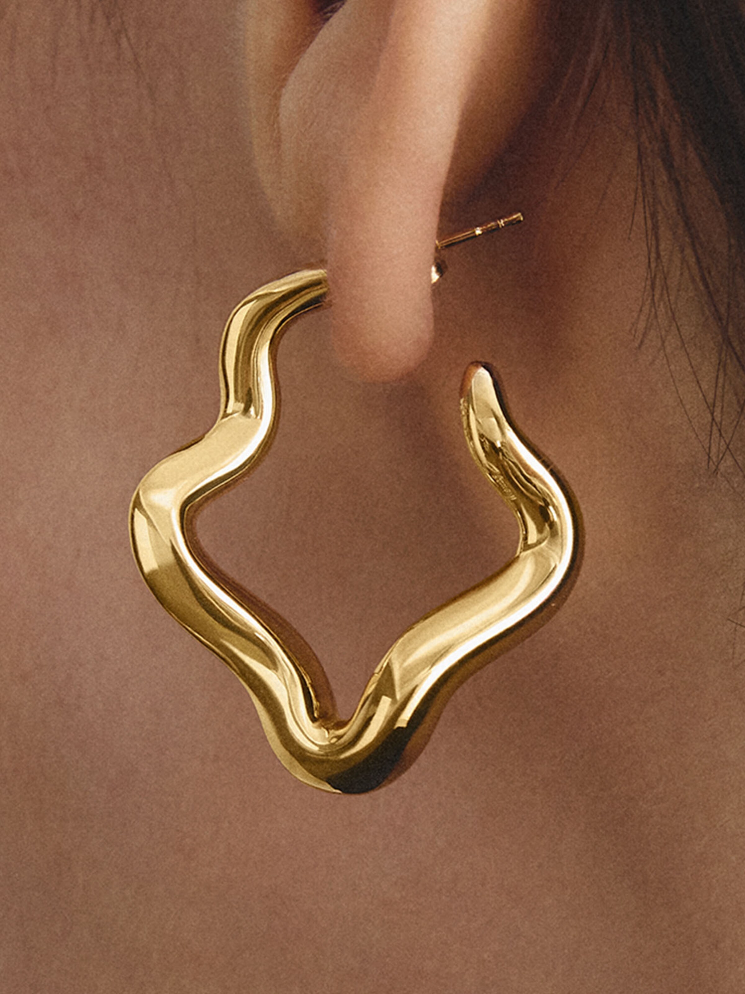 Thomas Sabo Creolen in Wellenform in Gold