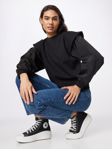 Sisley Sweatshirt in Black