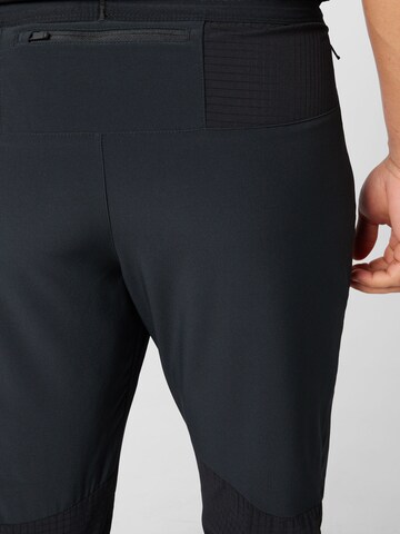 regular Pantaloni sportivi di NIKE in nero