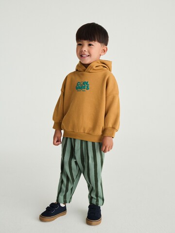 Next Joggingpak in Bruin: voorkant