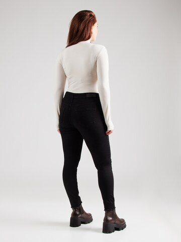 Skinny Jeans 'Carwilly' di ONLY Carmakoma in nero