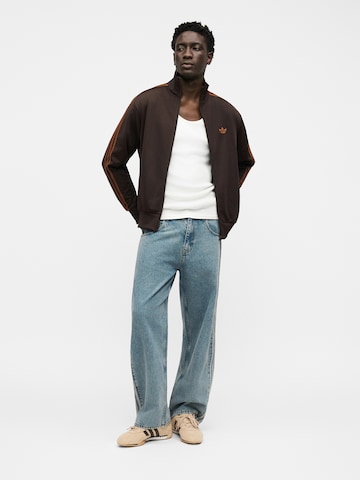 ADIDAS ORIGINALS - Loosefit Vaquero 'Firebird' en azul
