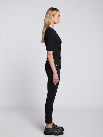 Skinny Jean Goldgarn en noir