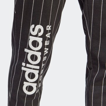 ADIDAS SPORTSWEAR Slimfit Παντελόνι φόρμας 'Pinstripe Fleece' σε μαύρο