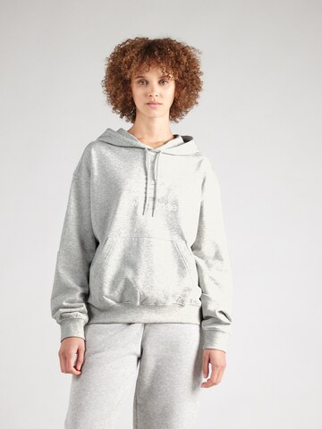 new balance Sweatshirt 'ESSENTIALS' in Grau: predná strana