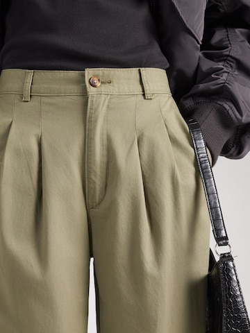 LEVI'S ® Широкий Брюки со складками в Зеленый