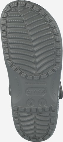 Clogs di Crocs in grigio