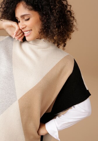Aniston SELECTED Strickponcho in Beige