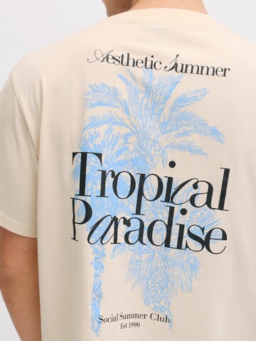 JJ Rebel Μπλουζάκι 'JREBCHRISTIAN' σε μπεζ