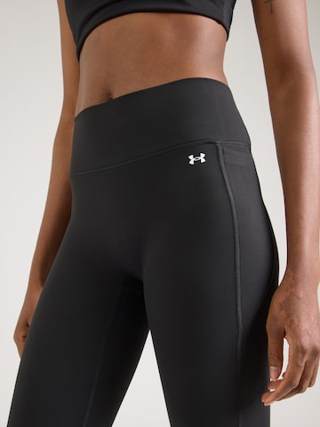 UNDER ARMOUR Skinny Sportnadrágok 'Motion' - fekete