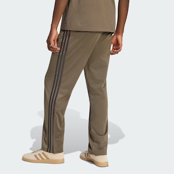 regular Pantaloni 'Firebird' di ADIDAS ORIGINALS in marrone