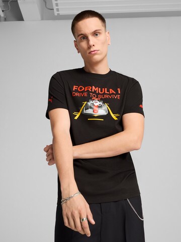 PUMA Тениска 'F1® Drive To Survive' в черно: отпред