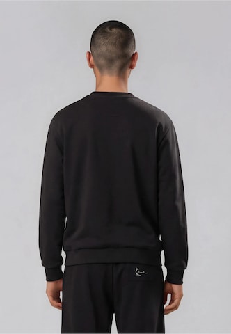 Sweat-shirt Karl Kani en noir