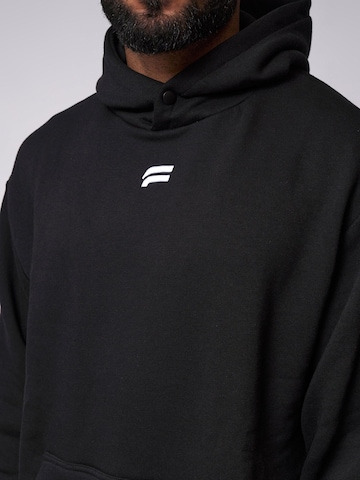 Pull-over 'Essential Oversized Hoodie' Fortex Fitness en noir