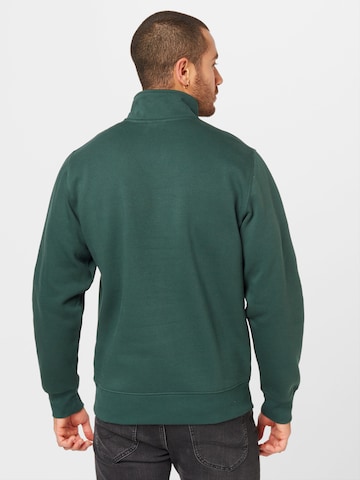 Carhartt WIP Regularny krój Bluzka sportowa 'Chase' w kolorze zielony