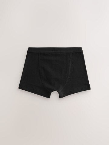 Next Σλιπ σε μαύρο