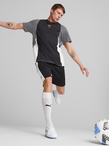 PUMA Functioneel shirt 'King' in Zwart