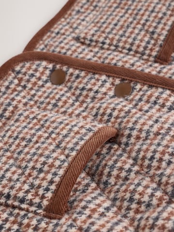 Next Tussenjas in Bruin