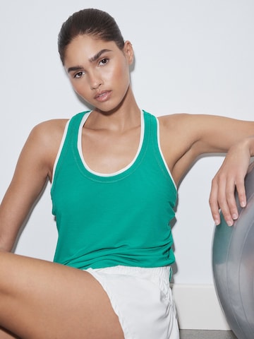 Next Sporttop in Grün