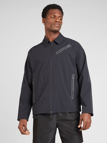 UNDER ARMOUR Sportjacke 'Unstoppable Vent' in Schwarz: predná strana