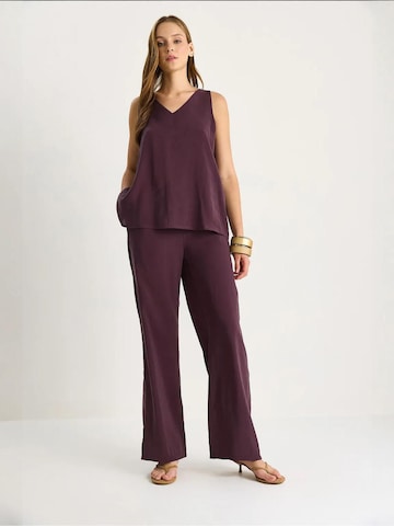 Pantalons de tailleur Bianco Lucci en violet