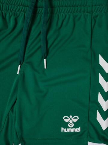 Hummel Regular Sports trousers in Green