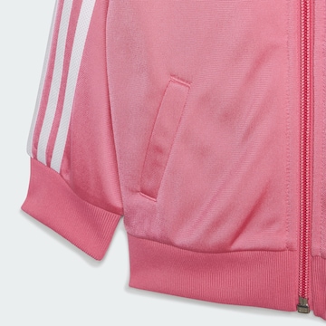 ADIDAS ORIGINALS Regular Joggingpak 'Adicolor' in Roze