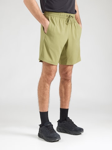 Reebok Szabványos Sportnadrágok 'WOR' - zöld: elől