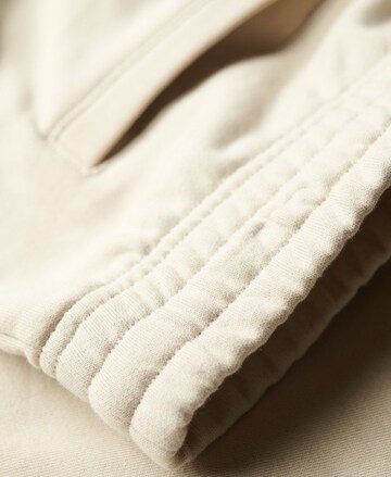 regular Pantaloni 'Essential' di Superdry in beige