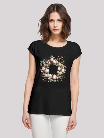 T-shirt 'Osterkranz Eierkranz Blumenring' F4NT4STIC en noir : devant